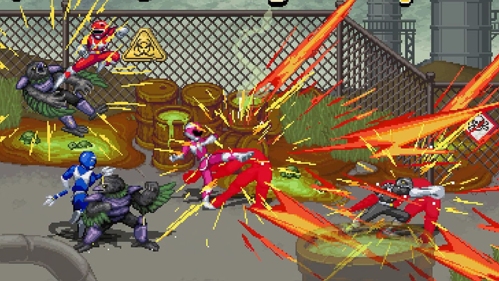 a group of power rangers are fighting each other in a video game .