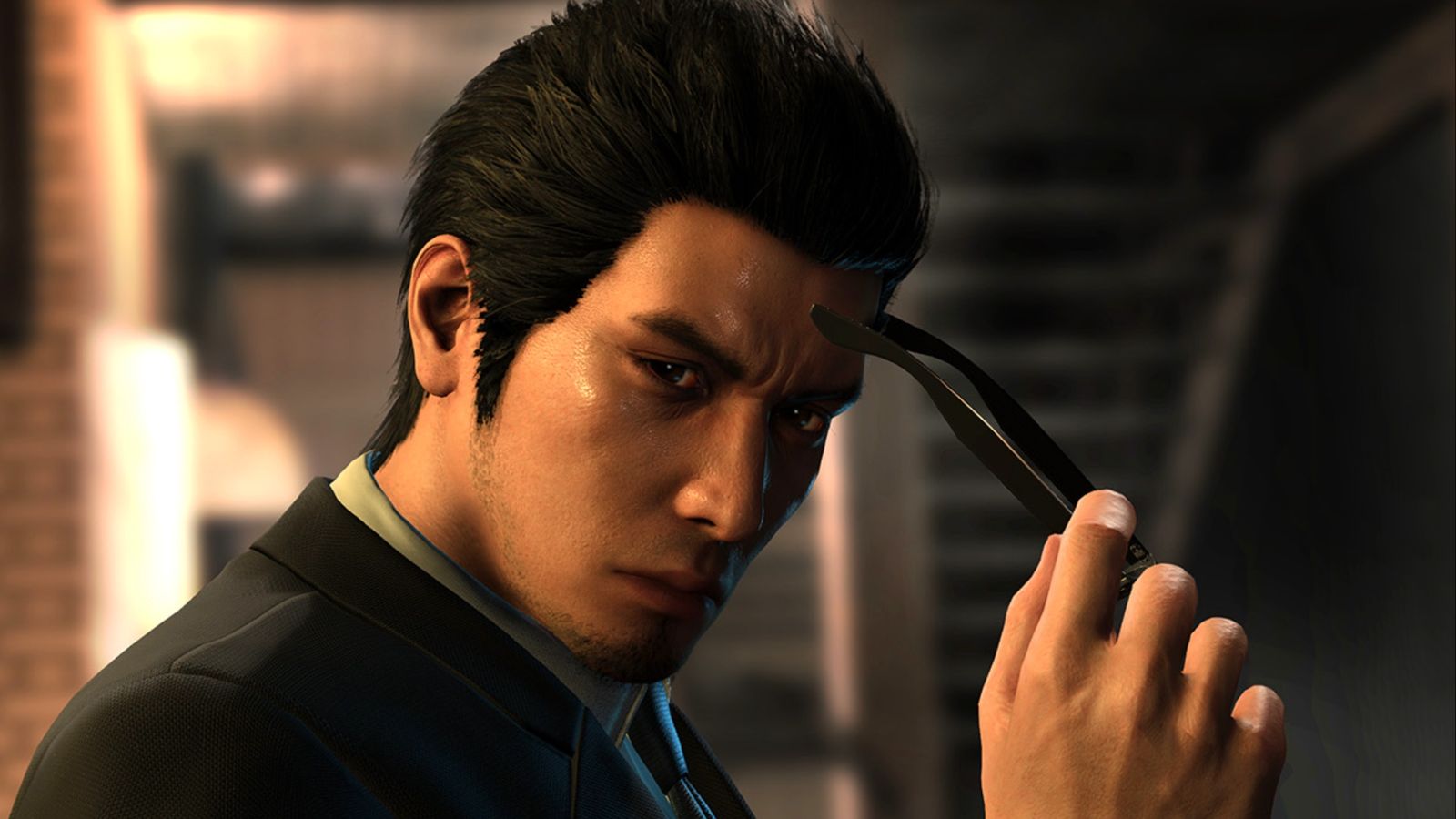 Kazuma Kiryu taking off sunglasses in Like a Dragon Gaiden